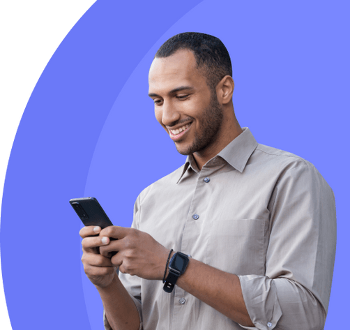 A person smiling at their phone while using Mentat